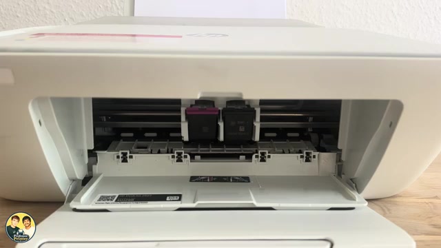 Source DeskJet with cartridge-access door open, colour cartridge on the left and black on the right.