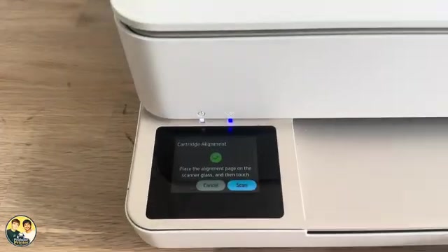 ENVY touchscreen asking for the printed alignment page on the scanner glass, with the Scan button shown